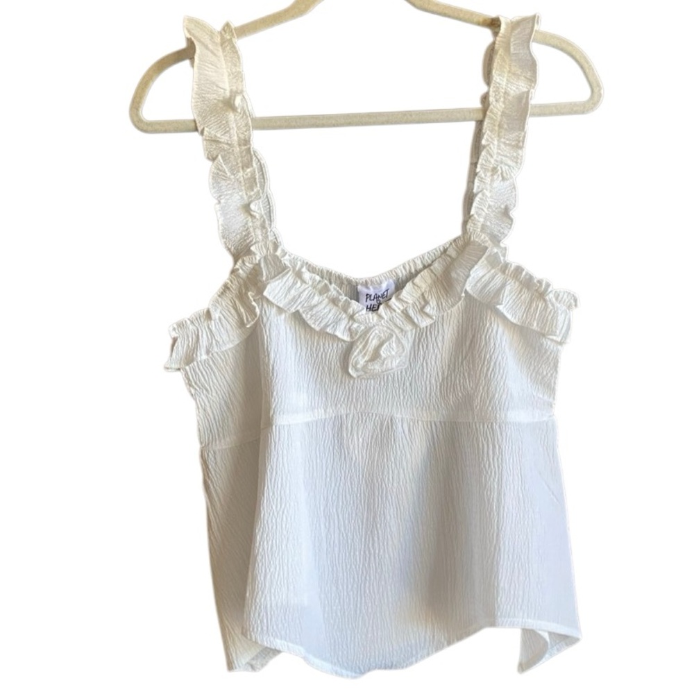 NWT Planet Heart White Ruffled Sleeveless Blouse. Size Large
